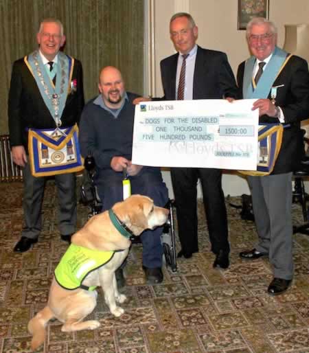 (l to r) WM WBro Roger Clark, Andy Lee with his dog Henry John Van Wyk, WBro Buster Evans, Charity Steward