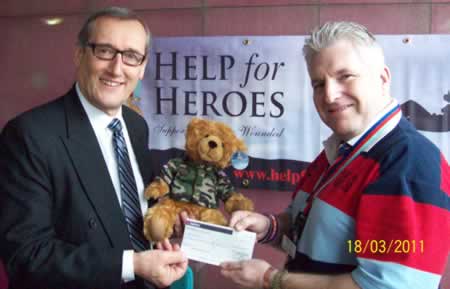 (l to r) Terry Downing receives the cheque ffrom WBro Mike Nixon