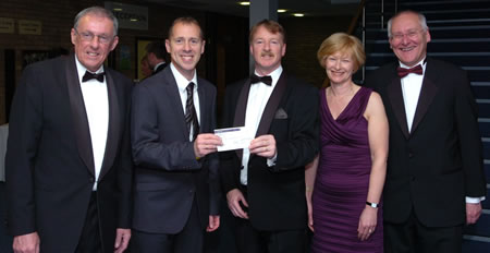 (l to r) WBros Tony Dicks (WM of Buckby Castle Lodge), Ian Spencer (Helping Hands), WBro Neil Carr, Mrs Julie Carr and WBro Keith Hewitt (WM of Danetre Lodge) - photo by courtesy of Daventry Express