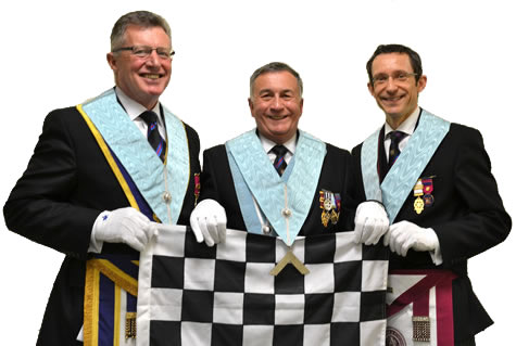 (l to r) WBro Tim Almond (SW), WBro Dermot Bambridge (WM) and WBro Trevor Ray (JW) with the  chequered flag presented to the Lodge by the Provincial Grand Chaplain, WBro Ray Hemingray