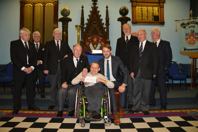 DPGM, VWBro Dr Viv Thomas (centre left) with Jason Merrill & Tom Scott & local Brethren