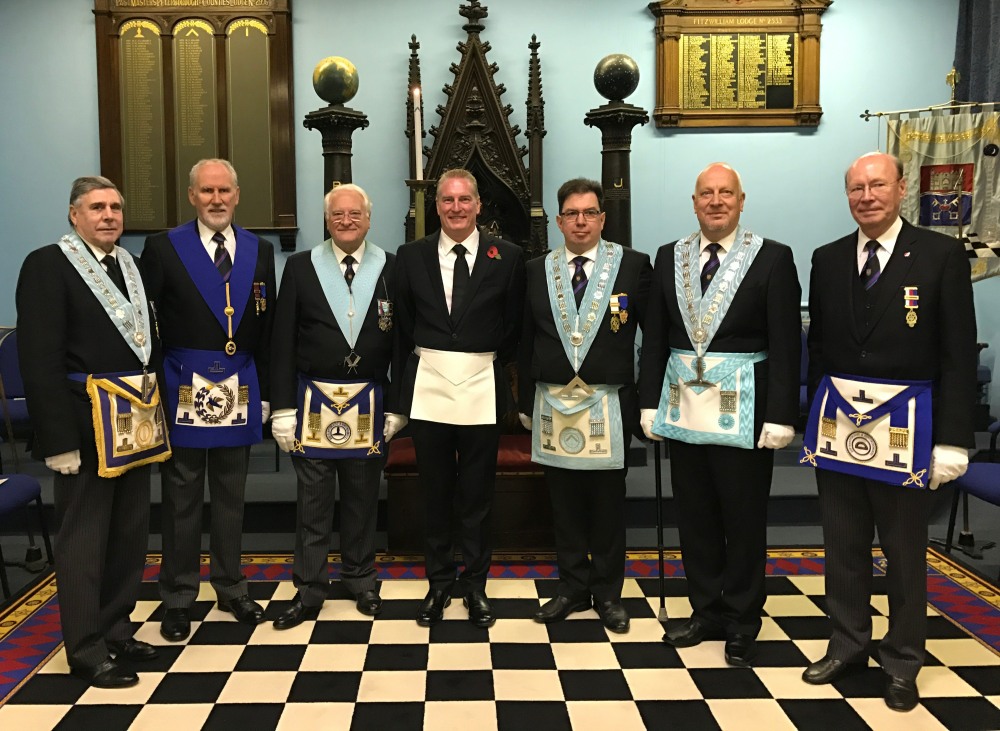 from left to right WBro John Humphrys( JW), WBro David Burton, APGM, WBro Eric Samler, Bro David Samler, WBro David Cawkwell(WM), Bro Jonathon Shelton (SW) and WBro Neil Handley( JD)